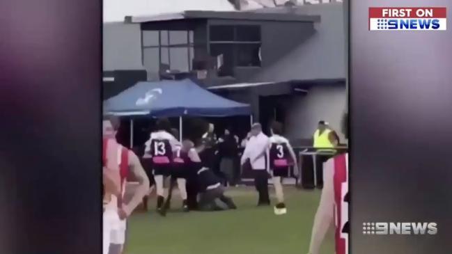 Football coach fired over on-field fight (9 News)