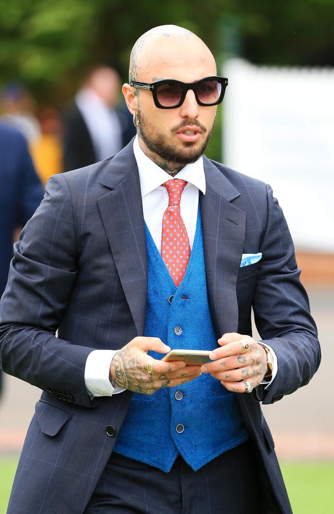 Fashion blogger Roberto Malizia arrives at Caulfield Racecourse. Picture: Mark Stewart