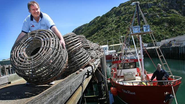 Hursey Seafood's directors David Hudson (front) and Mark Hursey prepare for the start of the Tasmanian rock lobster season at Stanley