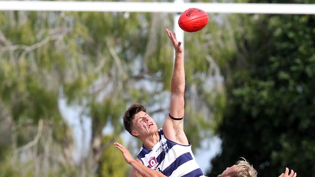 Ryan Pickering gets some air in the ball up. Picture by Richard Gosling