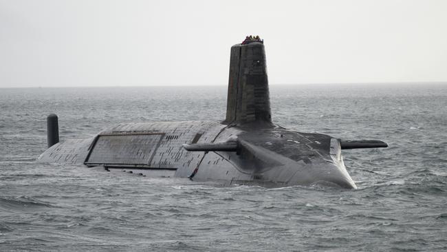 LARGS, SCOTLAND - FEBRUARY 27:  In this handout image provided by MoD Crown Copyright, HMS Vengeance departs for Devonport prior to re-fit on Ferbruary 27, 2012 off the coast of Largs, Scotland. The UK Ministry of Defence has awarded UK's leading naval support business Babcock, on March 25, 2012, with a contract to commence the planning phase for the ÃÂ£350 million GBP refit of Trident ballistic missile submarine HMS Vengeance, which will be undertaken at their Devonport Royal Dockyard. The project to upgrade and refuel the nuclear submarine will safeguard 2,000 UK jobs and will take around three and a half years. River Tamar shipping was suspended when the the 150m-long, 15,900-tonne submarine HMS Vengeance travelled to the Devonport Dockyard ahead of the scheduled refit on March 2, 2012, arriving amid concerns without a signed contract for the refit.  HMS Vengeance will be the last of four Vanguard class submarines to undergo a Lond Overhaul Period and Refuel LOP(R) at Davernport that will commence once HMS Vigilant leaves Devonport on completion of her LOP(R) in 2012. Mandatory Credit: (Photo by Andrew Linnett/MoD Crown Copyright via Getty Images)