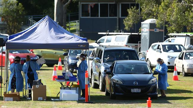 Busy scenes at a pop-up Covid-19 testing clinic at Indooroopilly State High School on Saturday. Picture: Jono Searle/Getty Images