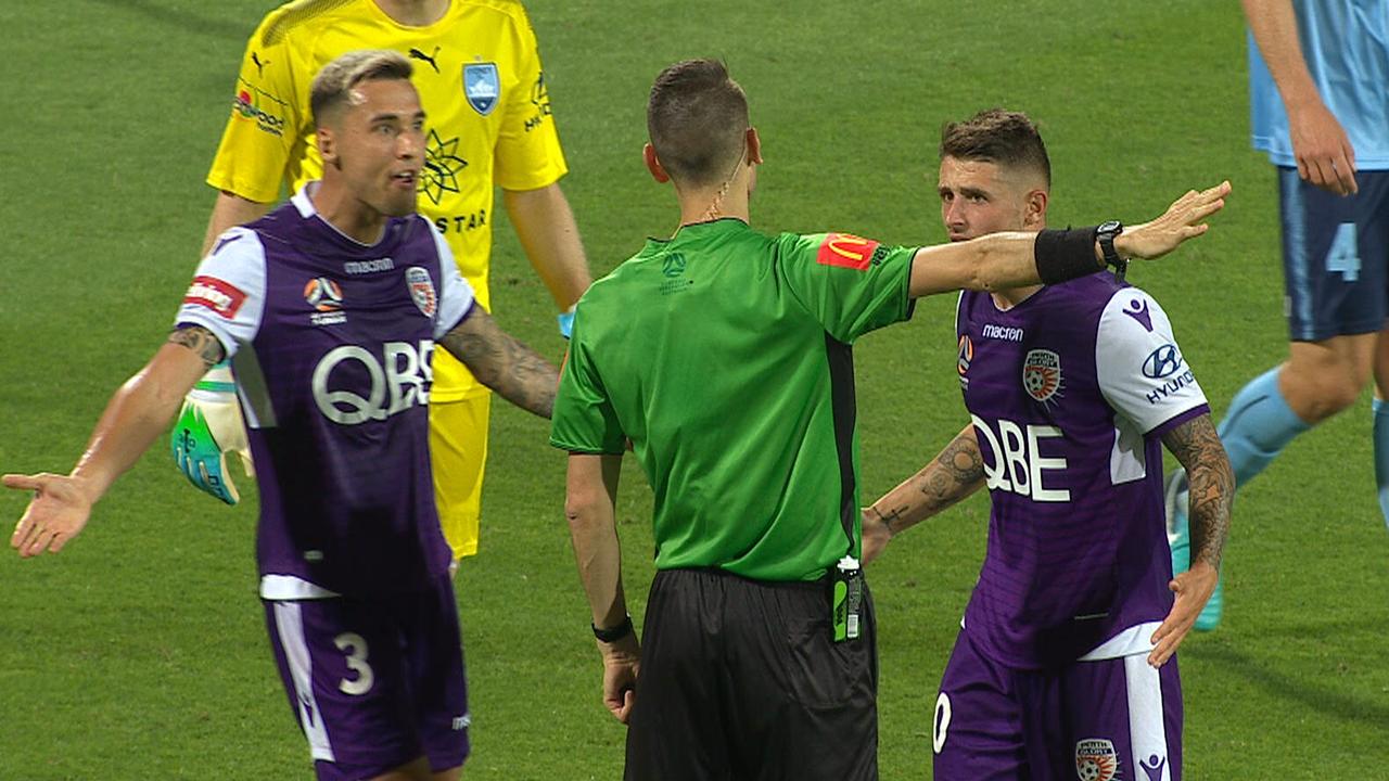 Perth Glory players protest a disallowed goal.