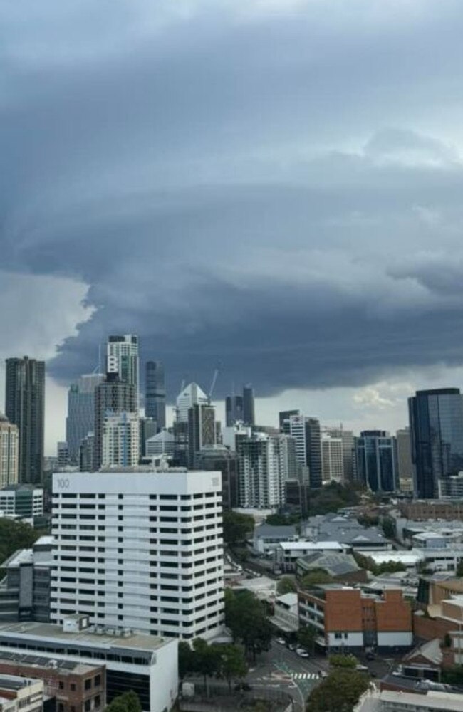 The storm approaching the Brisbane CBD. Picture: Hamish Alexander