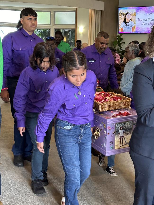 Corrine's family carry the casket at her funeral. Picture: Supplied