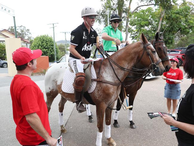 Polo players Morgan Ruig and Bill Taylor arrive at Oakleigh State School to vote. Picture: Peter Wallis