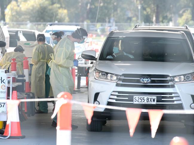 2 december, 2021: South Australian opposition leader Peter Malinauskas drives through the Victoria park covid testing site after having a close contact with former Premier Jay Weatherill.  Photo Kelly Barnes