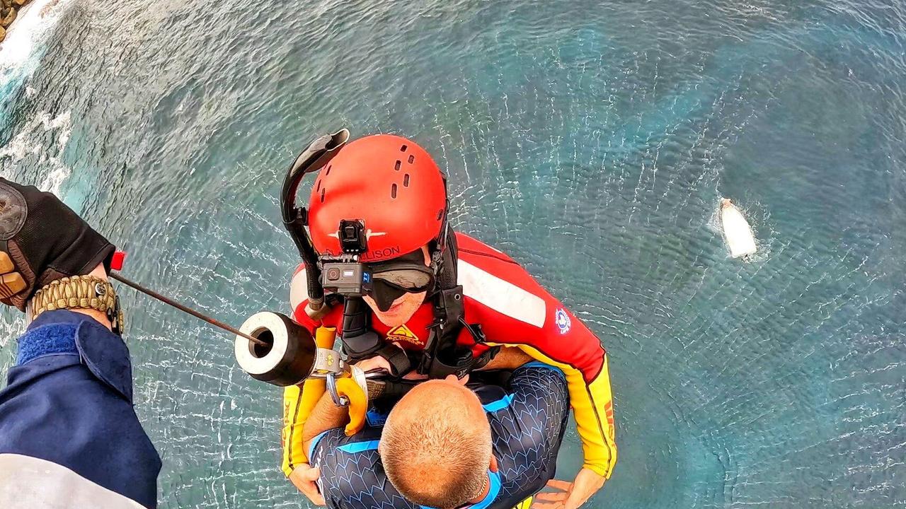 Three men were dramatically winched to safety after their boat capsized. Picture: Westpac Lifesaver Rescue Helicopters / Twitter.