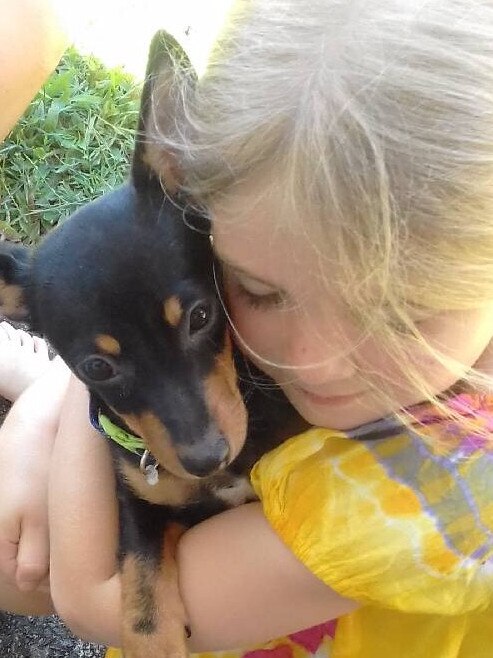 BAXTER: They call it puppy love. This is the day Elizabeth got her new dog, Baxter the chihuahua.