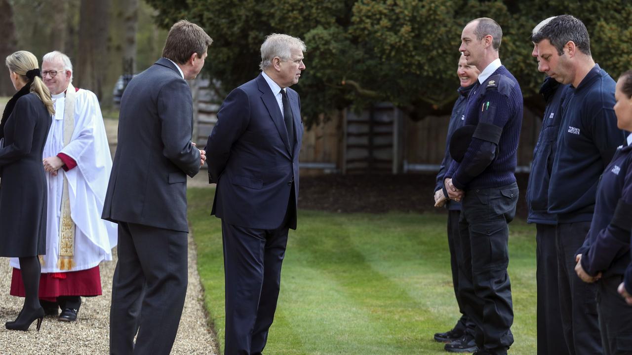 Prince Andrew talks to Crown Estate staff as they attend Sunday Service at the Royal Chapel of All Saints following the announcement of the death of Prince Philip. Picture: Steve Parsons – WPA Pool/Getty Images