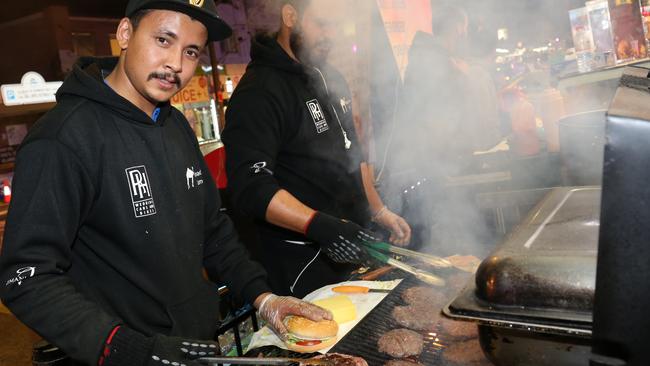 Bish Prajula grills the popular camel burgers during Ramadan Nights Lakemba. Picture: Robert Pozo