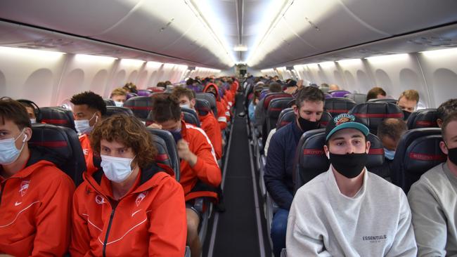 The Giants and Swans before taking off on a flight to Brisbane. Picture: Supplied