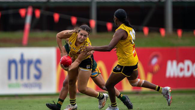 Maddy Rasmussen and Ashanti Bush in the St Mary's vs Nightcliff Tigers 2023-24 NTFL women's qualifying final. Picture: Pema Tamang Pakhrin