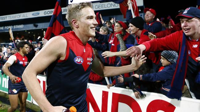 Bernie Vince celebrates Melbourne’s win over Geelong with the fans. Picture: Wayne Ludbey