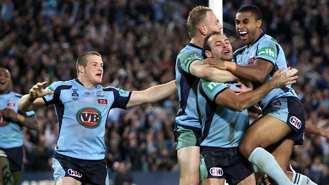 <p>State of Origin II, 2012: NSW players celebrate after Brett Stewart scores his second try.</p>