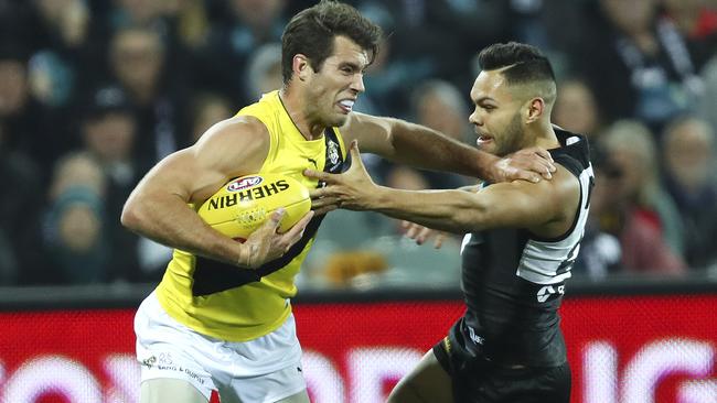 Rance was a beast after halftime, here he is making short work of Jarman Impey. Picture: Sarah Reed