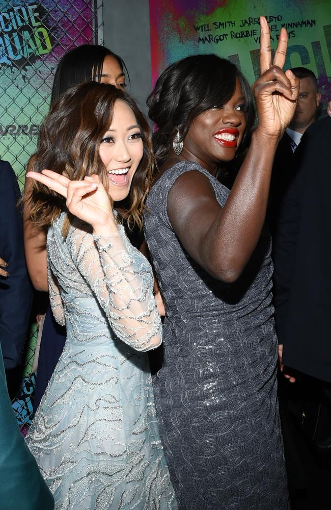 Karen Fukuhara and Viola Davis give the peace sign as they attend the Suicide Squad world premiere on August 1, 2016 in New York City. Picture: AP