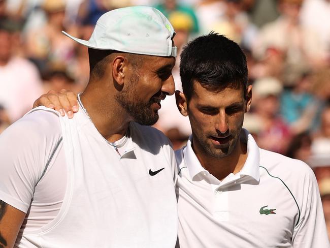 LONDON, ENGLAND - JULY 10: Winner Novak Djokovic of Serbia (R) and runner up Nick Kyrgios of Australia interact by the net following their Men's Singles Final match on day fourteen of The Championships Wimbledon 2022 at All England Lawn Tennis and Croquet Club on July 10, 2022 in London, England. (Photo by Ryan Pierse/Getty Images)