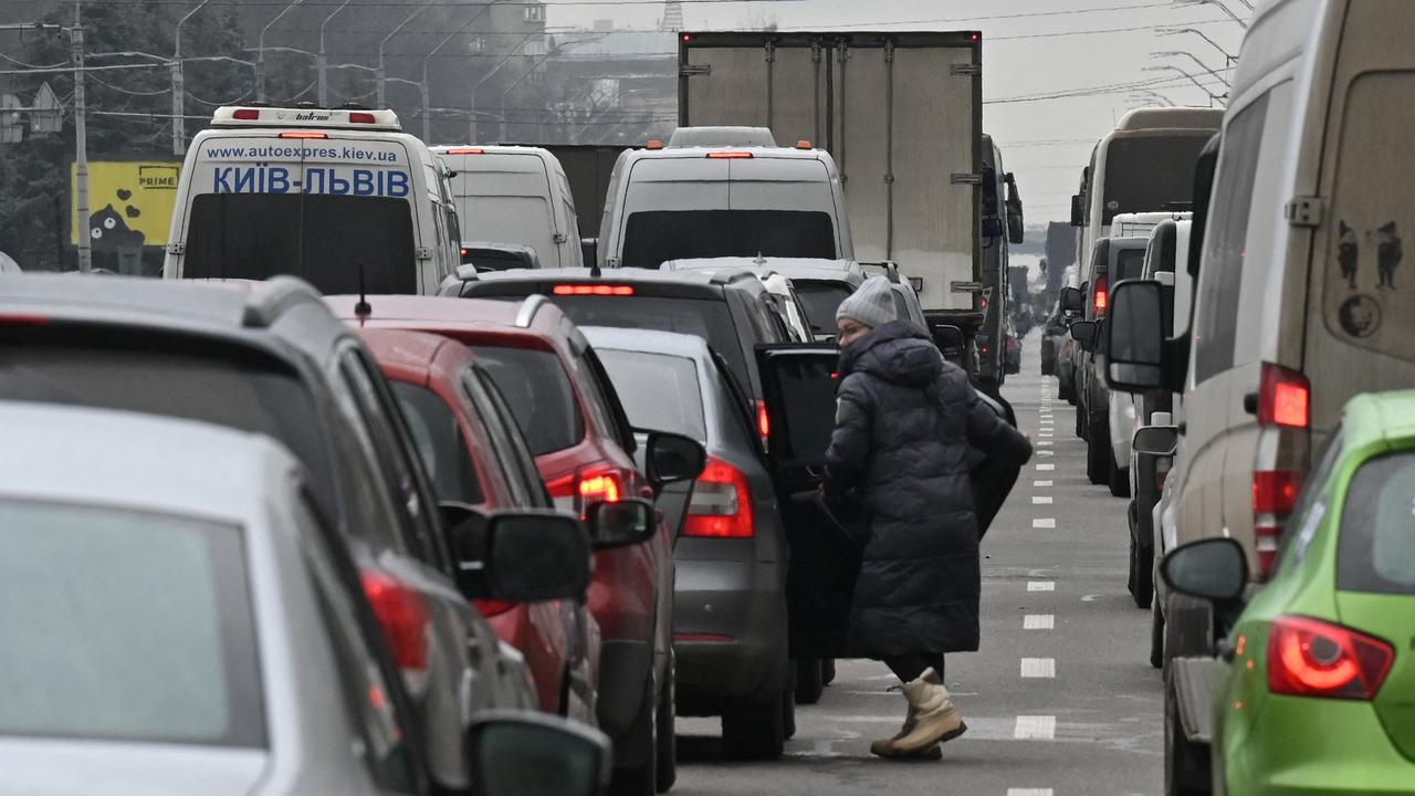 People stuck in a huge traffic jam as they try to leave Kyiv and head to western parts of the country on February 24. Picture: AFP