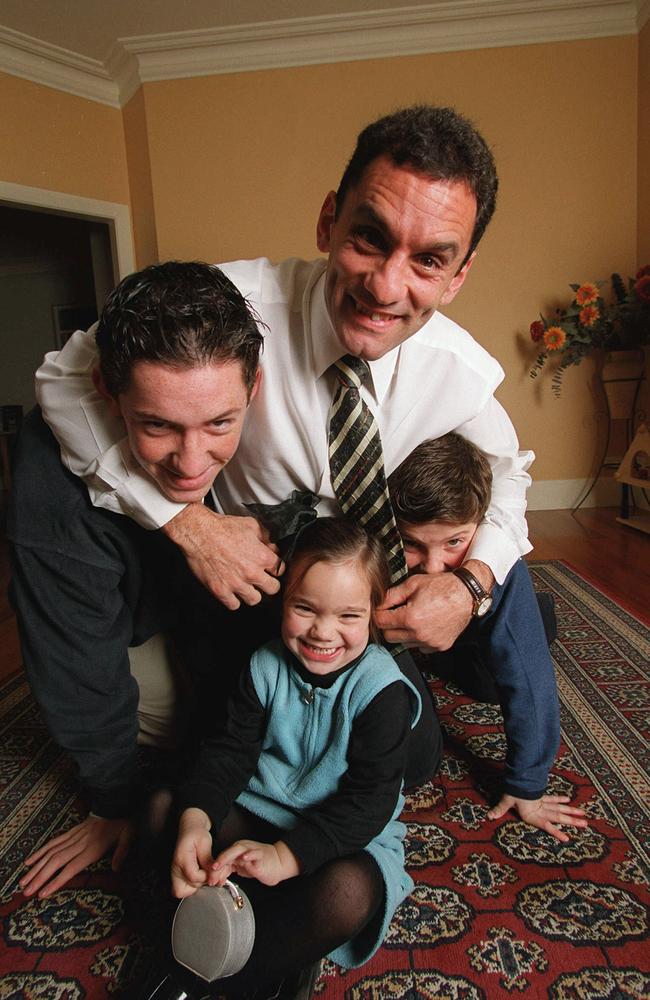 Tony Liberatore with his children, Chris, 15, Thomas, 8, and Megan, 3.