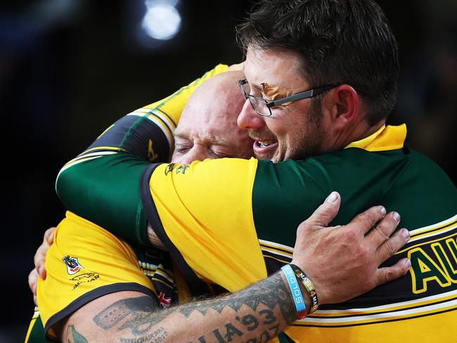 Australia's Davin Bretherton celebrates victory with Jamie Tanner at the Wheelchair Rugby Gold Medal match between Australia and the UK. Picture: Phil Hillyard