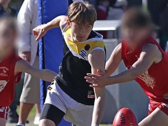 17-year old footballer Henry Nau ( middle )  in coma . Picture: MG Slattery Photography