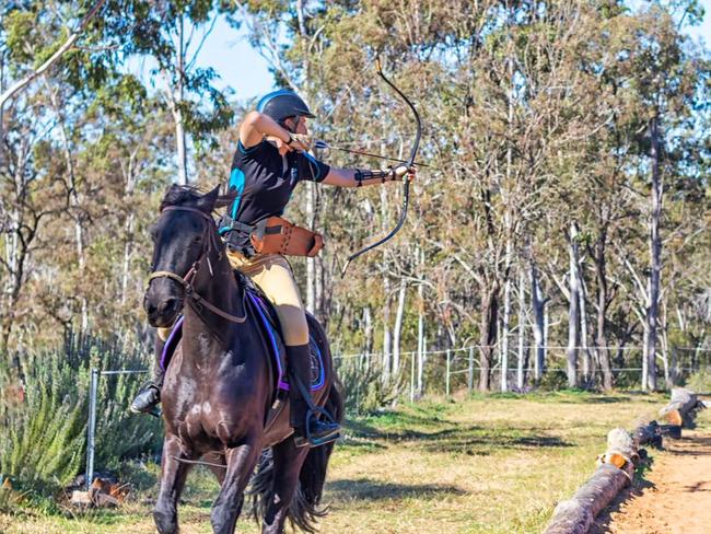 Steph Batterham shoots at a target