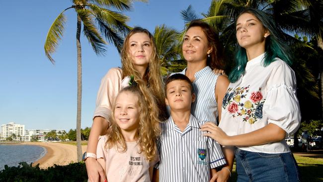 Marina Iashchenko with daughter Sofia Iashchenko, 8, with sister Iryna Tsiura with son Oleksandr Isivra, 9, and daughter Mariia Tsiura on the Strand. Picture: Evan Morgan