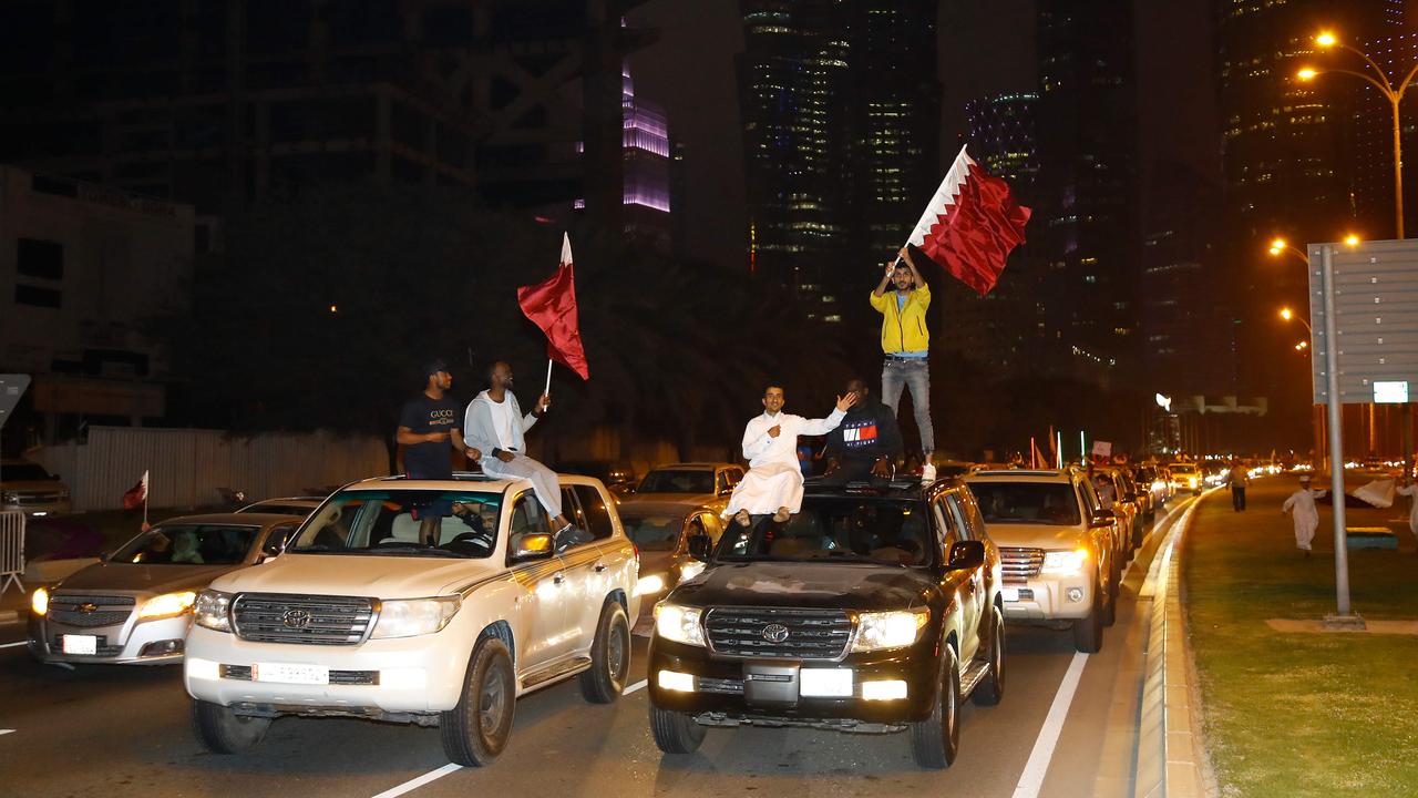 Qatari fans celebrate after their national team defeated UAE to qualify to the final of the 2019 AFC Asian Cup. Picture: AFP