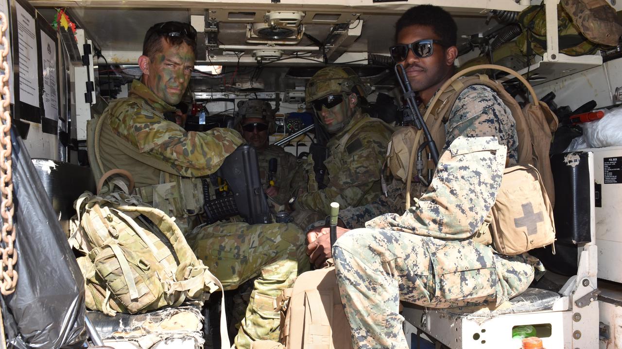 Exercise Talisman Sabre participants load into an armed personnel carrier after the open day at Port Denison Sailing Club, Bowen on Sunday. Picture: Kirra Grimes