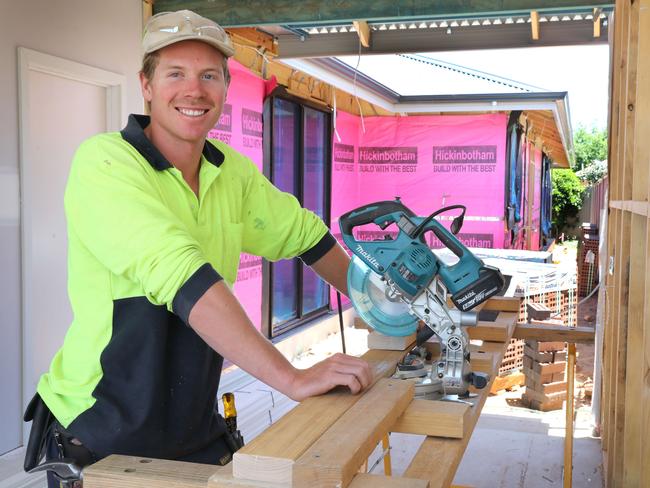 Hickinbotham have put on 80 new staff members to cope with the influx of work from government grants. Carpenter, Joe Love,25, of Plympton (0402366603), is one of those lucky to score a job with Hickinbotham. 23 December 2020. Picture Dean Martin