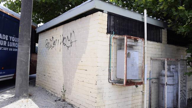 Graffiti vandals have repeatedly tagged the run-down toilet block. Picture: Andy Brownbill