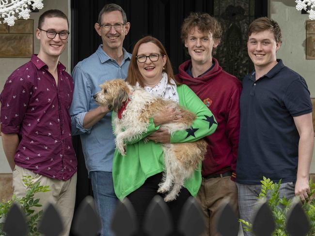 30/4/22 - Labor Boothby candidate Louise Miller-Frost and her triplet sons Riordan, Hamish and Jacques, all 22 with  husband Kim Cheater and dog Tim at their home in Cumberland Park. Picture: Naomi Jellicoe