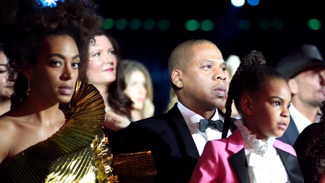 Will we ever get to know the story behind Solange's eyes? Pictured sitting with Jay-Z and Beyonce’s daughter Blue Ivy Carter. Picture: Christopher Polk/Getty