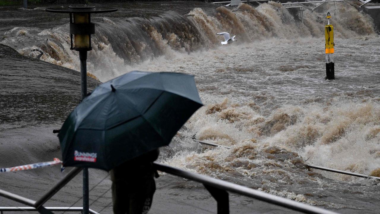 A seagull flies over the flooded Parramatta river during the heavy rain in Sydney. Picture: Speed KHAN/AFP