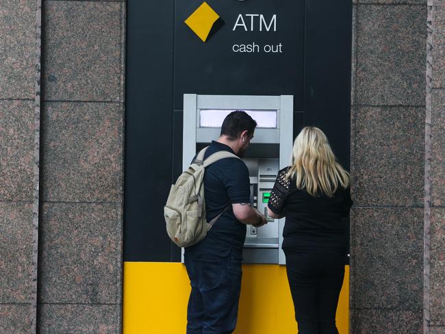 SYDNEY, AUSTRALIA -Newswire Photos JANUARY 24, 2022: A general view of people at the Comm Bank ATM on George Street in Sydney CBD as the cost of living continues to rise.  Picture NCA Newswire/ Gaye Gerard