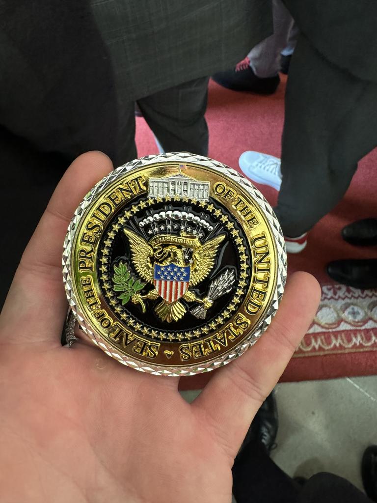 Joe McGuire was presented with a medal by Donald Trump at the White House.