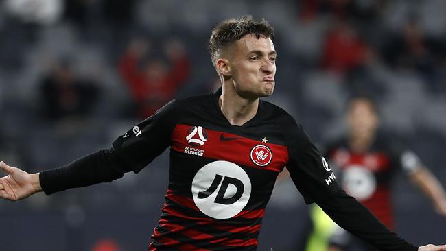 Jordan O'Doherty of the Wanderers celebrates after scoring his teams second goal in round 24 of the A-League against Melbourne Victory.