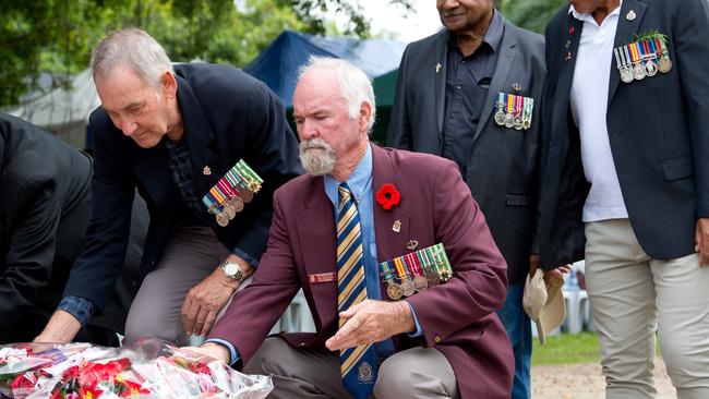 Ken Higgins lays a wreath at the Anzac Day service in Mackay last year.