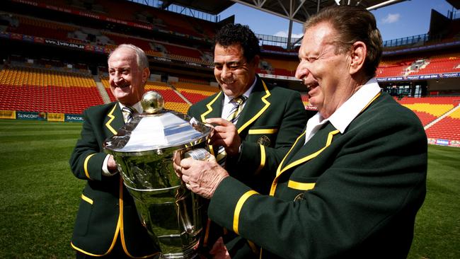 Rugby League greats l-r John Raper,Mal Meninga & Graeme Langlands with the Rugby League World Cup during a promotional launch at Suncorp Stadium .