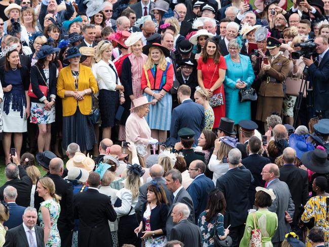 Queen Elizabeth II (C) greets guests at a garden party at Buckingham Palace on May 16, 2017 in London, England. pICTURE: gETTY
