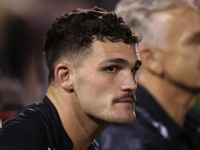 PENRITH, AUSTRALIA - MARCH 21: Nathan Cleary of the Panthers looks on from the bench during the round three NRL match between Penrith Panthers and Brisbane Broncos at BlueBet Stadium on March 21, 2024 in Penrith, Australia. (Photo by Jason McCawley/Getty Images)