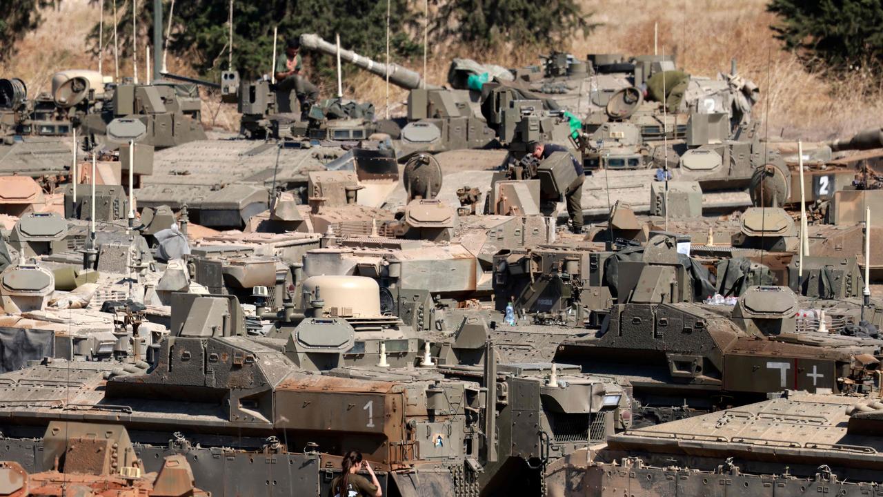 Israeli tanks massing in the country’s north, near its border with Lebanon. Picture: Menahem Kahana/AFP