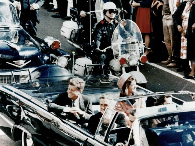 President John F Kennedy in the presidential limousine before his assassination. His wife Jacqueline is next to him and Texas Governor John Connally and his wife Nellie sit in front. (Photo by Universal History Archive/Universal Images Group via Getty Images)