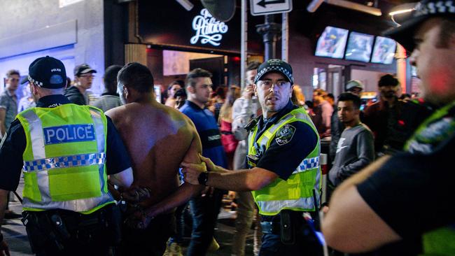 The lockout was designed to control rising anti-social behaviour that led to arrests such as here on Hindley Street on New Year's Day. Picture: Morgan Sette