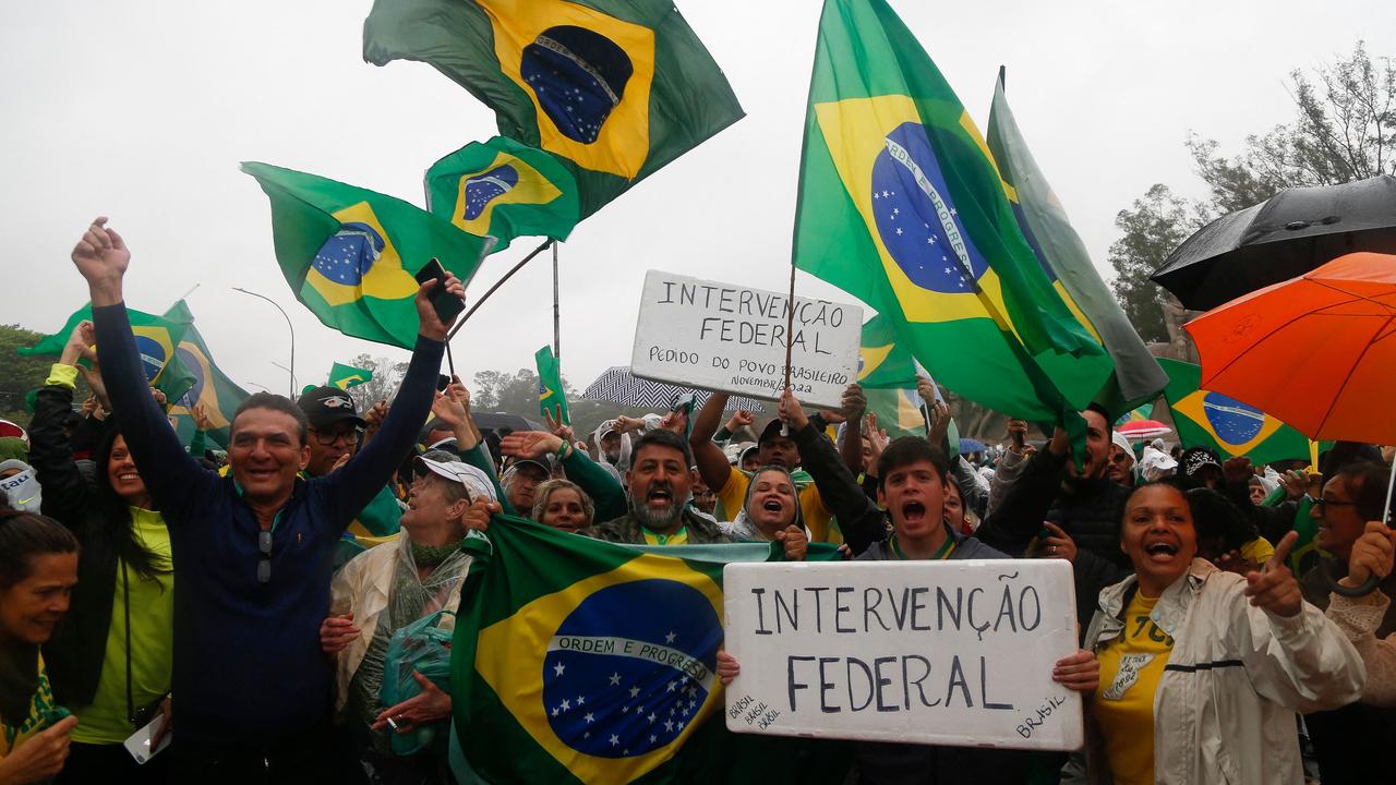 Supporters of Brazilian President Jair Bolsonaro take part in a protest to ask for federal intervention in downtown Rio de Janeiro, Brazil, on November 2, 2022. Picture: Miguel Schincariol/AFP