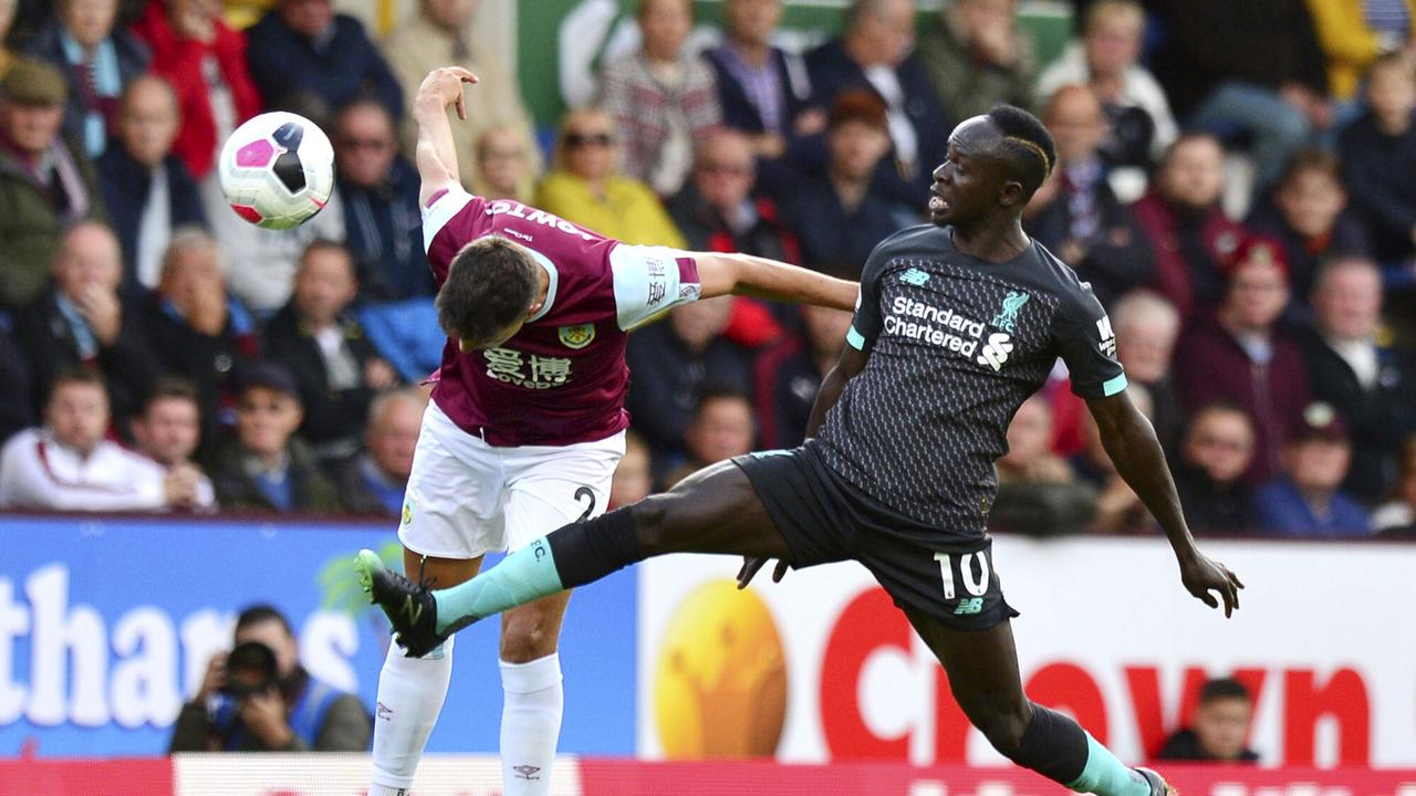 Liverpool's Sadio Mane (R) was influential — but not completely pleased — in Liverpool’s victory over Burnley. (Anthony Devlin/PA via AP)