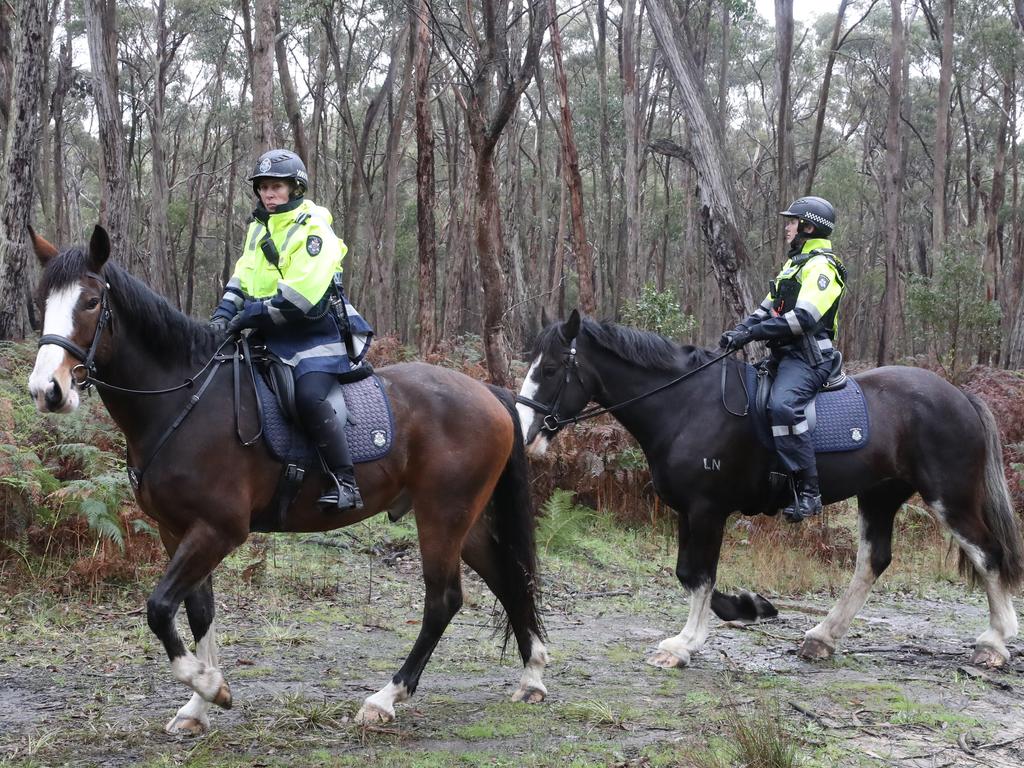 Police on horseback join a search in an area around Enfield State Park for the body of Samantha Murphy. Picture: David Crosling