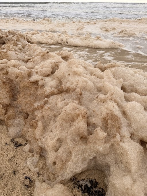 It was less than ideal swimming conditions on the Sunshine Coast on Sunday morning. Picture: Mark Furler