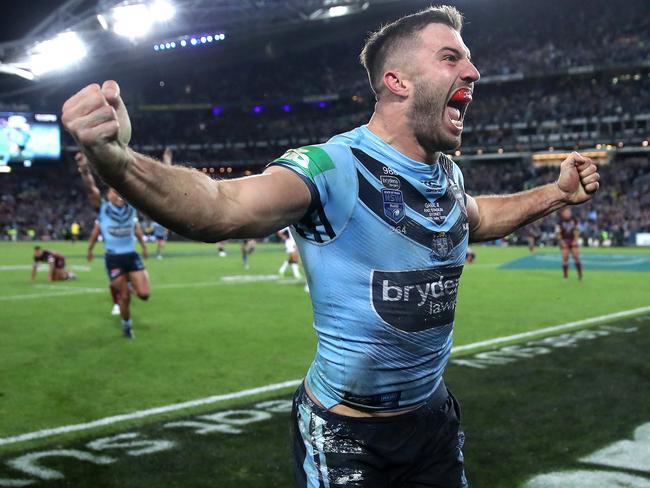 NSW's James Tedesco celebrates winning try with Mitchell Pearce during Game 3 of the State of Origin series between NSW Blues and Queensland at ANZ Stadium, July 10, 2019. Picture. Phil Hillyard